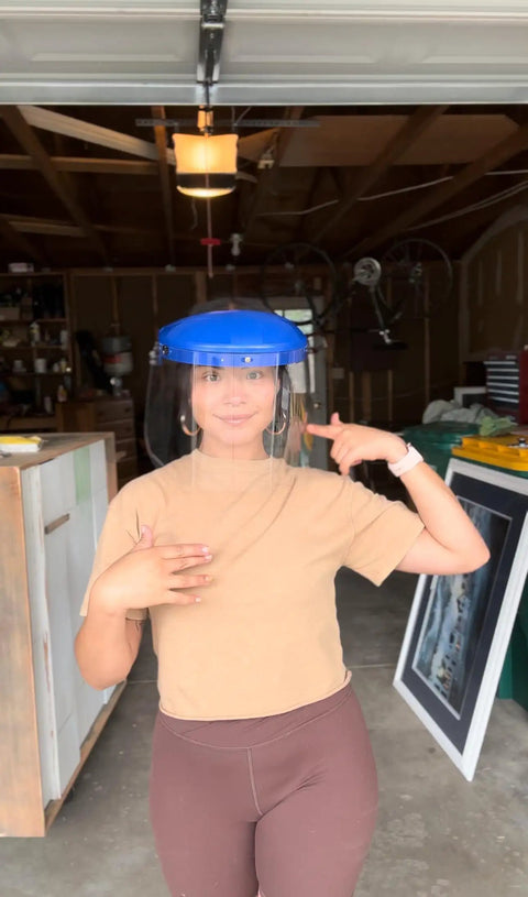 Woman wearing Built Tough Ansi Z87.1 Face Shield Kit Featuring Adjustable Headgear Plus Ten Clear Polycarbonate Shields.