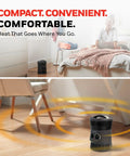 360 Degree All Around Heat Portable Space Heater in a small room, emitting warmth, Charcoal Grey, for small to medium rooms.