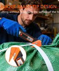 Dual Lock Safety Box Cutter With Retractable Blade, Hella Handy Package Opener For Quick Cuts, Includes Snap-Off Blades, Film Cutter And Tape Splitter For Warehouse And In-Store Cutting, orange-black tool cutting strapping over green bag