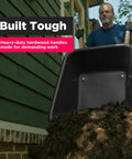 Man using Heavy Duty Wheelbarrow Handle Set Built Tough From American Hardwood, Shock Absorbing Grips, One And Five Eighths Inch Fit