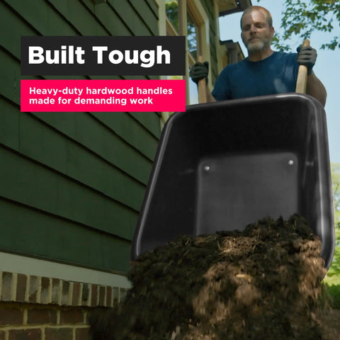 Man using Heavy Duty Wheelbarrow Handle Set Built Tough From American Hardwood, Shock Absorbing Grips, One And Five Eighths Inch Fit