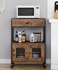 Industrial Farmhouse Coffee Bar Cart With 3 Tier On Wheels Rustic Brown Mobile Coffee Station Table With Storage For Home Kitchen And Bar Liquor Buffet Sideboard Cabinet featuring a microwave, bottles, and toaster on top tiers.