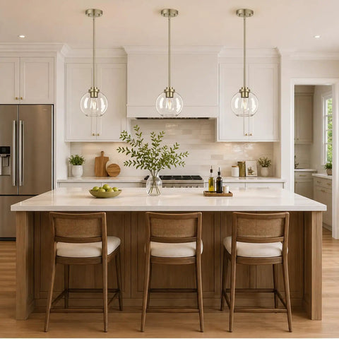 MQMQA 2 Pack Globe Pendant Lights, Mid Century Brass Pendant Light Fixtures hanging over a kitchen island with glass shades.