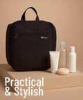 On The Go Travel Toiletry Bag With Ten Compartments Hanging Cosmetic Organizer with bottles on beige background