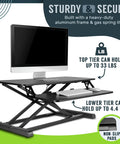 32 Inch Adjustable Standing Desk Converter for Home Office Sit to Stand Desk Setup with Keyboard Tray and Dual Monitor Riser Black Height from 4.3 to 19.7 Inches, shown with a monitor and keyboard.