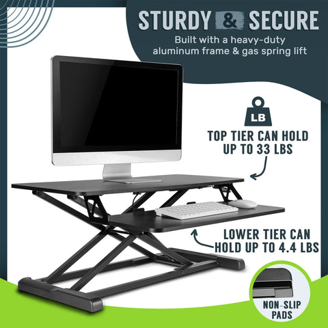 32 Inch Adjustable Standing Desk Converter for Home Office Sit to Stand Desk Setup with Keyboard Tray and Dual Monitor Riser Black Height from 4.3 to 19.7 Inches, shown with a monitor and keyboard.