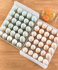 Fridge Egg Holder With 60 Grid Storage, 2 Layer Drawer Style Egg Carrier Box showcasing eggs, ultra large capacity tray on wooden surface.