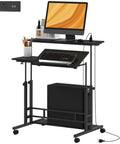 Level Up Your Daily Grind With This Electric Adjustable Standing Desk Featuring A Built In Power Hub With Dual Usb Ports And A Roll Away Storage Shelf In Sleek Black Finish, highlighting USB ports.