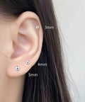Five Pair Silver Stainless Steel Ball Stud Earrings Set For Women Hypoallergenic Round Studs In 3mm To 7mm Sizes For Everyday Wear And Gift Giving Tarnish Resistant Jewelry Kit Essentials, ear model with 3mm, 4mm, 5mm studs
