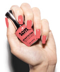 Hand holding a bottle of Hollywood Vibes Hema Free Gel Nail Polish Delivers Long Lasting Chip Resistant Manicure For Weeks Safe For Sensitive Skin 9ml Bottle Premium Salon Quality Gel Polish Without Hema Or Di Hema