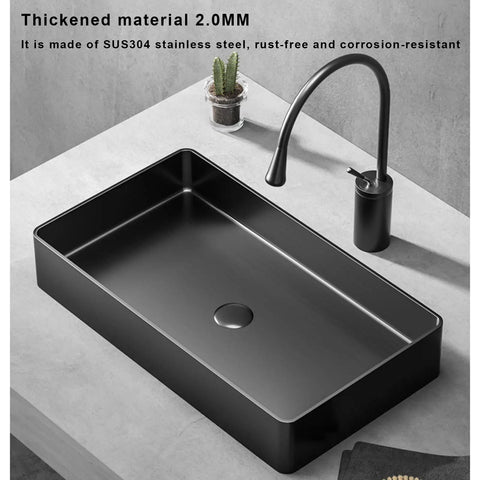 Modern Black 304 Stainless Steel Countertop Bathroom Sink Paired With Streamlined Faucet, thick black basin and sleek faucet on a countertop.