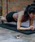Purple Tribal Pattern Stainless Steel Timer With Magnetic Base Dope Countdown Timer used in gym while person exercises.
