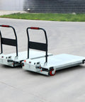 Heavy Duty Electric Scissor Lift Table, 660 Lbs Hydraulic Lifting Cart With Plug And Play Controls on concrete surface.