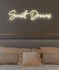 Lit Neon Sign Wall Art Decor 25x6.4 Inches Real LED Neon Light in bedroom above bed with 'Sweet Dreams' text