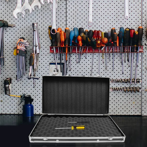 Open Rugged Aluminum Case With Foam Inserts Portable Hard Case Organizer For Tools And Gear on a workbench