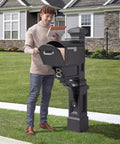 Man using Atherton Mail Post For Side And Undermount Mailboxes, No-Fuss Install, Weather Resistant Outdoor Post, Onyx Black Finish.
