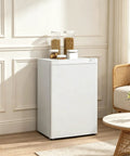 3 Cu Ft Compact Upright Freezer With Reversible Door And Bright White Shell in a modern living room setting.