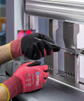 Cut Resistant Nitrile Coated Work Gloves With Firm Grip ANSI A4 Palm Dip handling metal sheets.