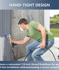Man using 7/8 Inch RAC X Hand Tight Tip Guard With Blue Base G7/8 Thread Reversible Spray Nozzles on wall