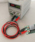 Power supply connected to Ten Piece Dope DC-DC Buck Regulator Module Set 4.5-24V Input To 5V Output Adjustable 0.8-17V Fixed