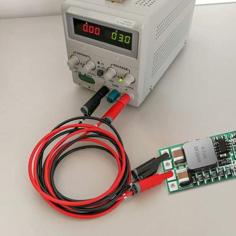 Power supply connected to Ten Piece Dope DC-DC Buck Regulator Module Set 4.5-24V Input To 5V Output Adjustable 0.8-17V Fixed