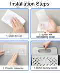Installation steps for Hanging Laundry Basket Hamper With Handle, Collapsible Wall Mount, showing wall cleaning and sticker application.