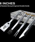 Heavy Duty Grillin Gift Set For Retired Men Dad Grandpa Boss Coworker Teacher BBQ Lovers Stainless Steel Grill Utensils With Non Slip Handles In A Durable Aluminum Carry Case shown with spatula, fork, tongs, and basting brush.