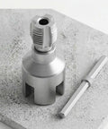Badass 4 In 1 Pipe Threader Wrench Heavy Duty for internal and external threading with precision grip on concrete surface.