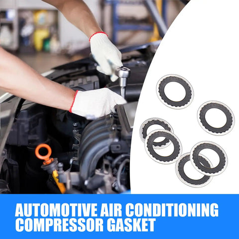 Thirty Piece Auto Air Conditioning Compressor Port Gasket Kit with rubber sealing rings in use during vehicle maintenance.