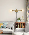 Gold Plug In Wall Sconce Two Light Bathroom Vanity Light Brass Wall Reading Light Retro Vibe Mid Century Modern Style For Hallway Living Room And Dining Room Lighting in a modern living room.