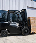 Heavy Duty Counterbalance Forklift Diesel Powered With 3ton Capacity Hydraulic Lift Mast System Built For Tough Warehouses And Industrial Jobs Features Rops Roof Guard Safety Cage And Load Backrest Protector For Peak Performance, side view with pallets.