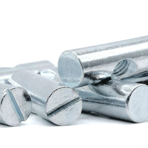 Close-up of zinc-plated cross dowel nuts from the Cross Dowel Barrel Nut Replacement Kit For 100507 Furniture Fasteners