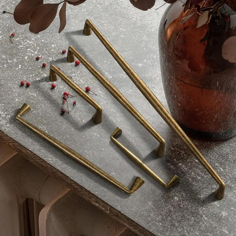 Brushed Brass Cabinet Handles, 12.6 Inches, 320mm Hole Center, Zinc Alloy Pulls For Kitchen And Bedroom displayed on tabletop