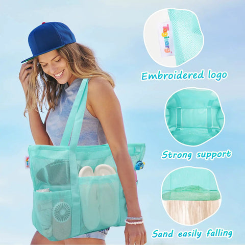Woman carrying Blue Mesh Beach Bag With Zipper, Large Sandproof Waterproof Tote for beach toys and pool gear with 8 pockets.
