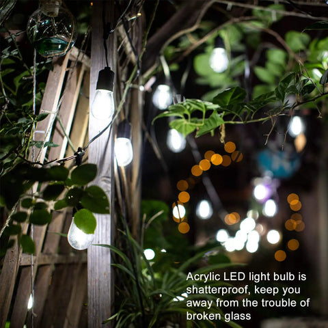 30-Foot Cool White LED Outdoor String Lights With 10 Hanging Sockets, illuminating pergola with greenery, waterproof festoon lighting.