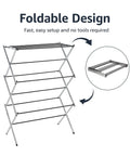 Hassle Free Top Shelf Foldable Indoor Clothes Drying Rack Heavy Duty Steel Laundry Stand For No Sweat Garment Care Rust Proof Chrome Finish Compact Storage Ready, showing foldable design and easy setup.
