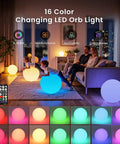 Family relaxing with Huge 16 Inch RGB Night Light Ball With Remote Control Color Changing Waterproof Glow in living room.