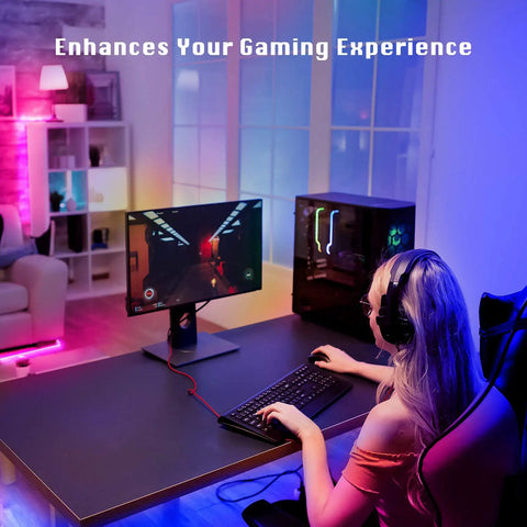 Person gaming with Bluetooth Led Strip Lights for Bedroom 100 Feet with App Control and IR Remote RGB Color Changing lighting