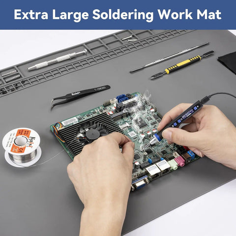 Hands using a soldering iron on a circuit board on Beefy Extra Large Soldering Mat For Electronics Repair 932F Heat Resistant Silicone Workbench Pad.
