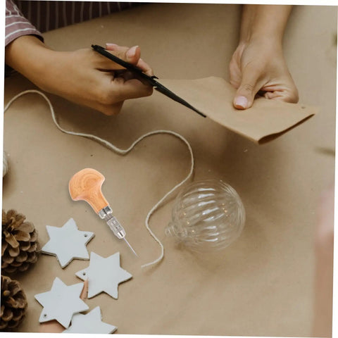 Crafting scene featuring Pro Grade Three Piece Pin Vise Drill Set for jewelry making and watch repair with wooden handle