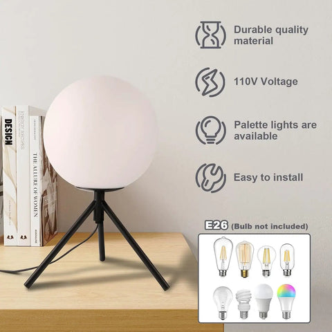 Modern Black Globe Table Lamp With Opal Glass Ball On A Metal Tripod Base Mid Century Inspired Bedside Lamp beside books