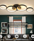 Ultra Sleek Modern LED Flush Mount Ceiling Light With Four Ring Design, 28.7 Inch Black Fixture in living room setting