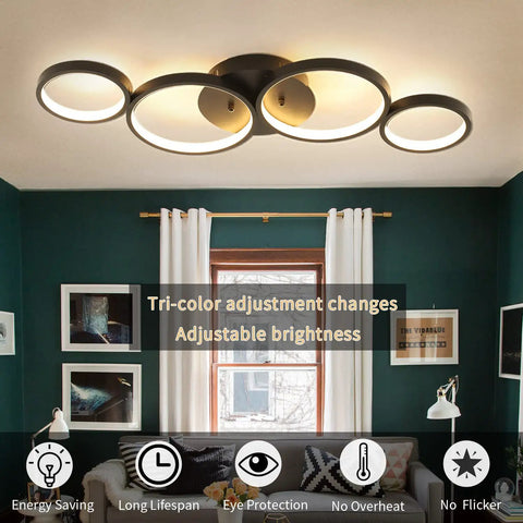 Ultra Sleek Modern LED Flush Mount Ceiling Light With Four Ring Design, 28.7 Inch Black Fixture in living room setting