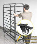 Rock Solid Heavy Duty Fabric Roll Storage Rack With Adjustable Hanging Rod and Smooth Rolling Locking Wheels for Vinyl Tablecloths and Textile Garage Workspace Organization System, being wheeled.