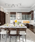 Kearney 6-Light Foldable Track Lighting In Brushed Nickel With White Glass Shades adjustable in modern kitchen.
