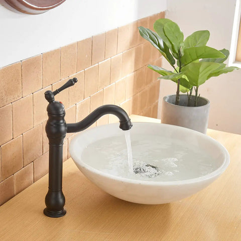 Matte Black Vessel Sink Faucet With 360 Degree Swivel, Single Handle One Hole Lavatory Mixer Tap in modern bathroom setting