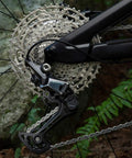 Deore CS M6100 12 Speed Cassette 10 To 51T for Mountain Bikes installed on bicycle with aluminum carrier and steel cogs.