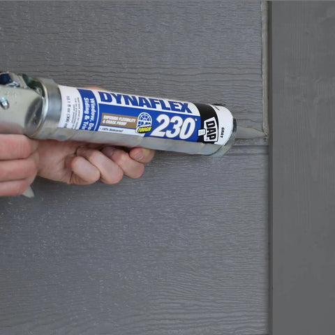 Applying Premium Elastomeric Sealant in Aluminum Gray on exterior wood siding, 100 percent waterproof and weatherproof