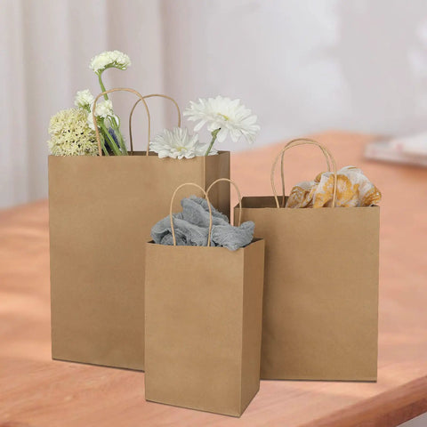 90 Pack Kraft Paper Bags With Handles Bulk Assorted Sizes For Favors Party Takeout Grocery Retail Craft Merchandise Goody Bags In Three Sizes 5.25x3.25x8.25 In, 8x4.75x10 In, 10x5x13 In with flowers inside