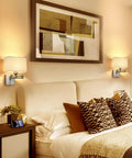 9.5 Inch Wall Lamp With USB Port And Dimmer, Plug In Cord Sconce With White Fabric Shade in cozy bedroom setting